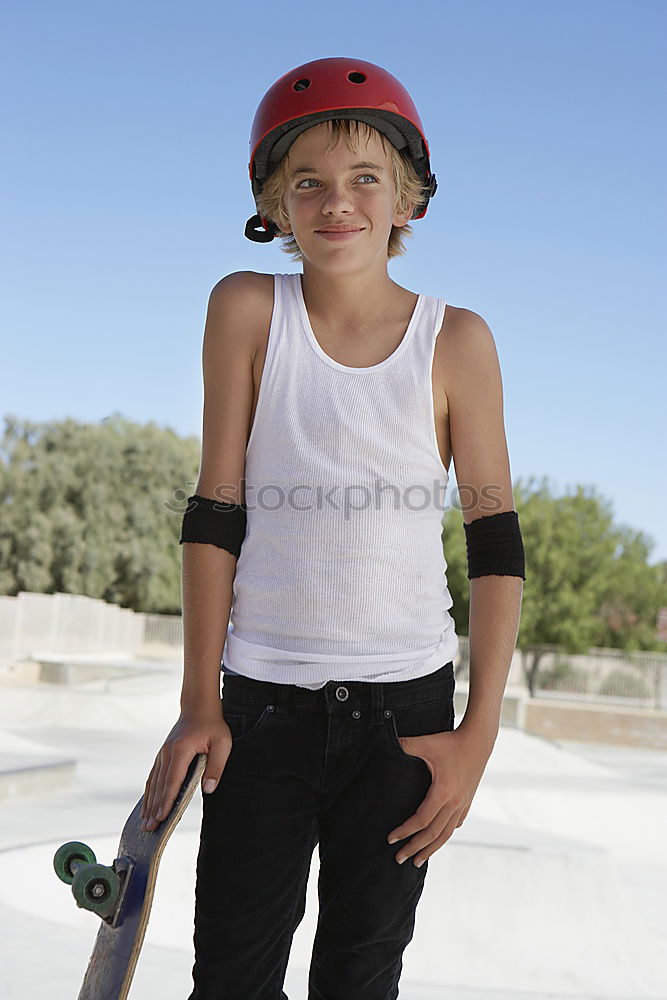 Similar – Cool gap | Portrait of a boy with a bicycle helmet and a tooth gap