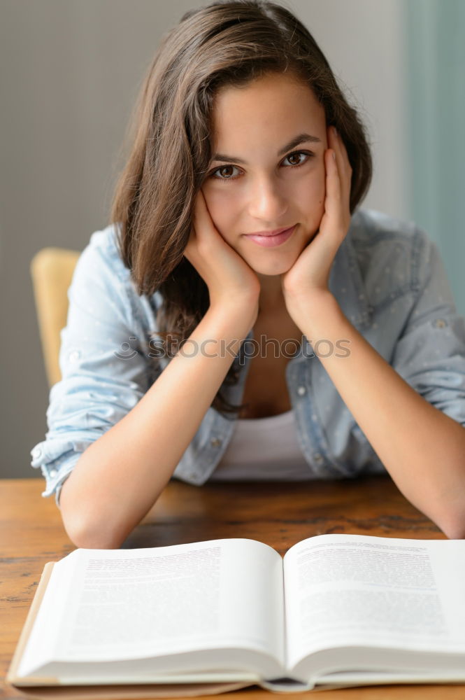 Similar – Image, Stock Photo Cute little girl lying on the carpet reading a book