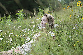 Similar – Woman with a sign in the park