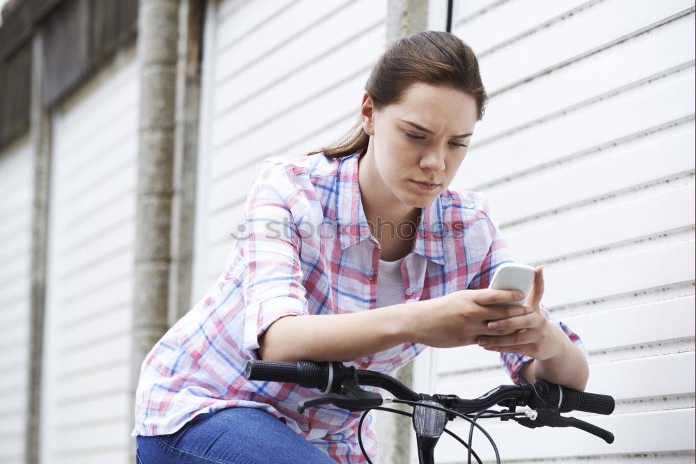 Similar – Attractive blond woman checking her mobile phone