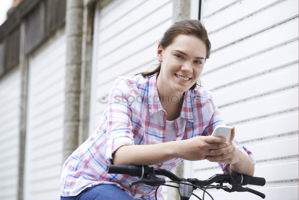 Similar – Image, Stock Photo Women with bikes browsing smartphone