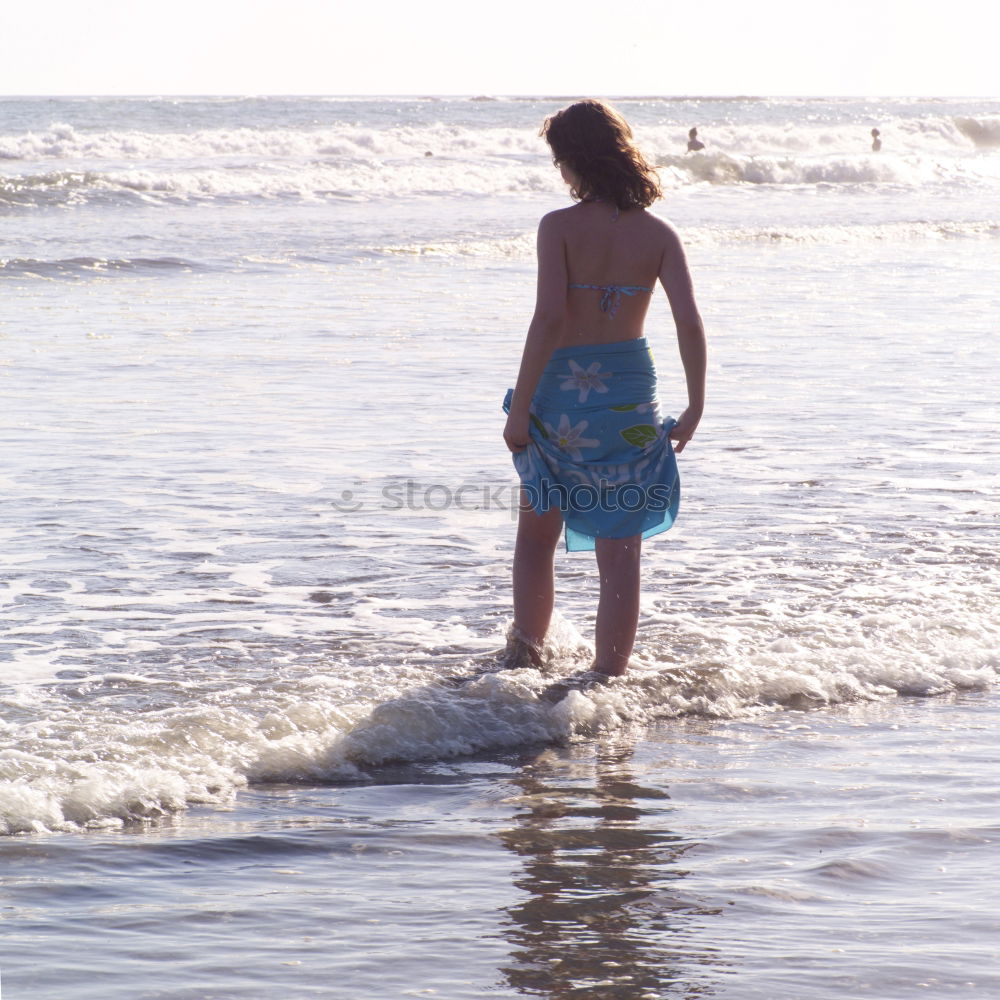 Similar – Girl at the Beach Ocean