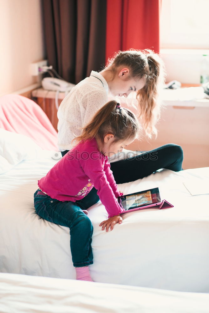 Image, Stock Photo African mother helping daughter doing homework