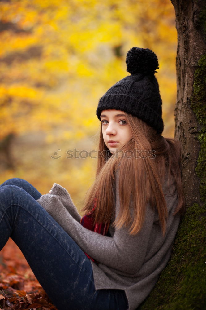 Similar – portrait Young pretty woman in winter in a log cabin in the snow