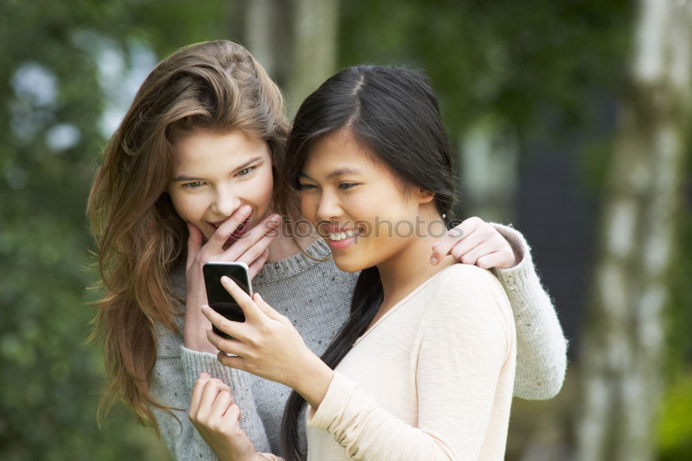 Similar – happy mother and daughter making selfie outdoor