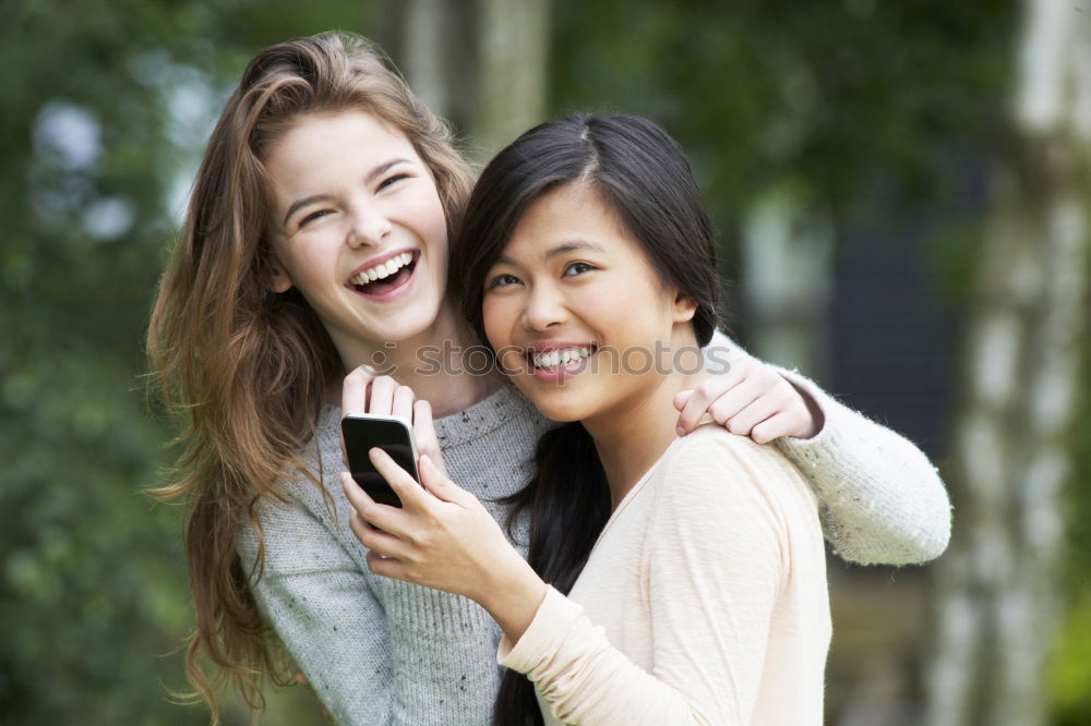 Similar – happy mother and daughter making selfie outdoor