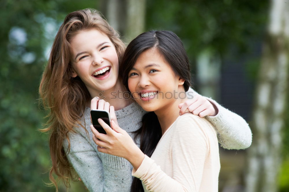 Similar – happy mother and daughter making selfie outdoor