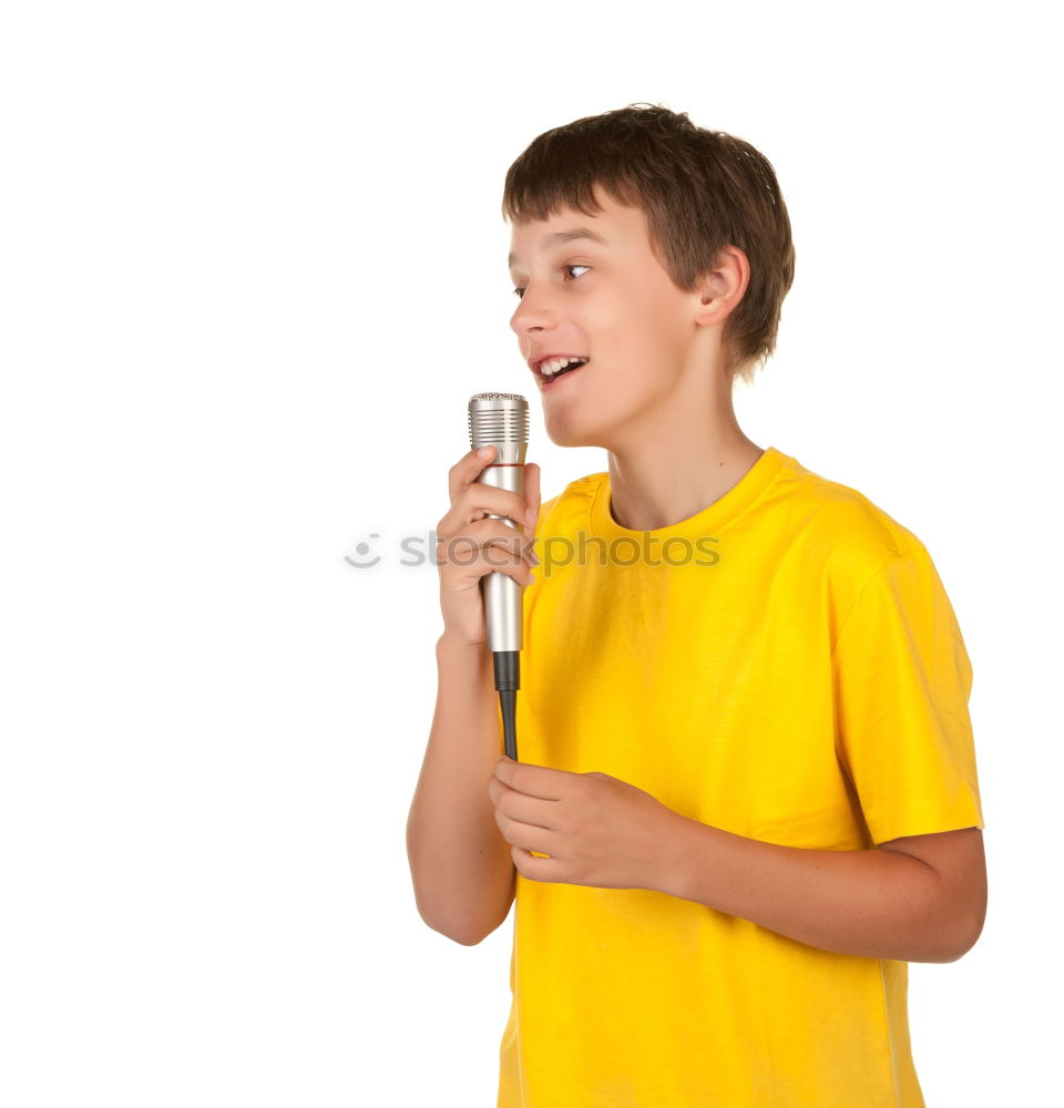 Boy singing to microphone