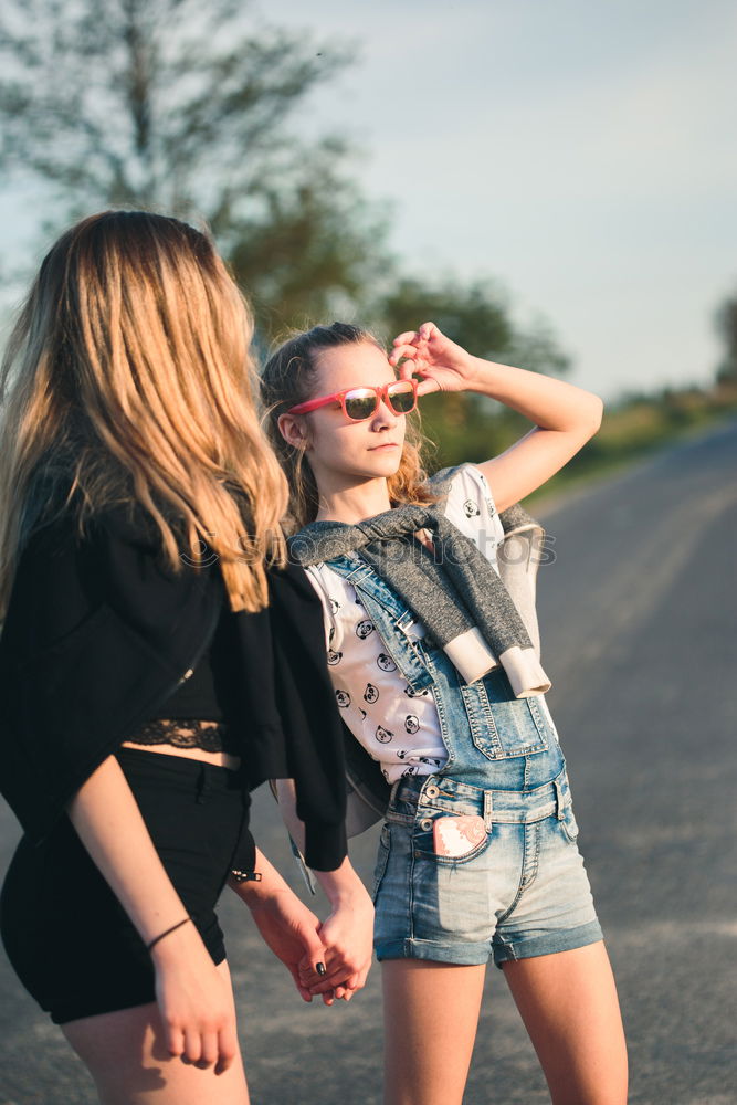 Similar – Young adult best friends cheering with confetti on party