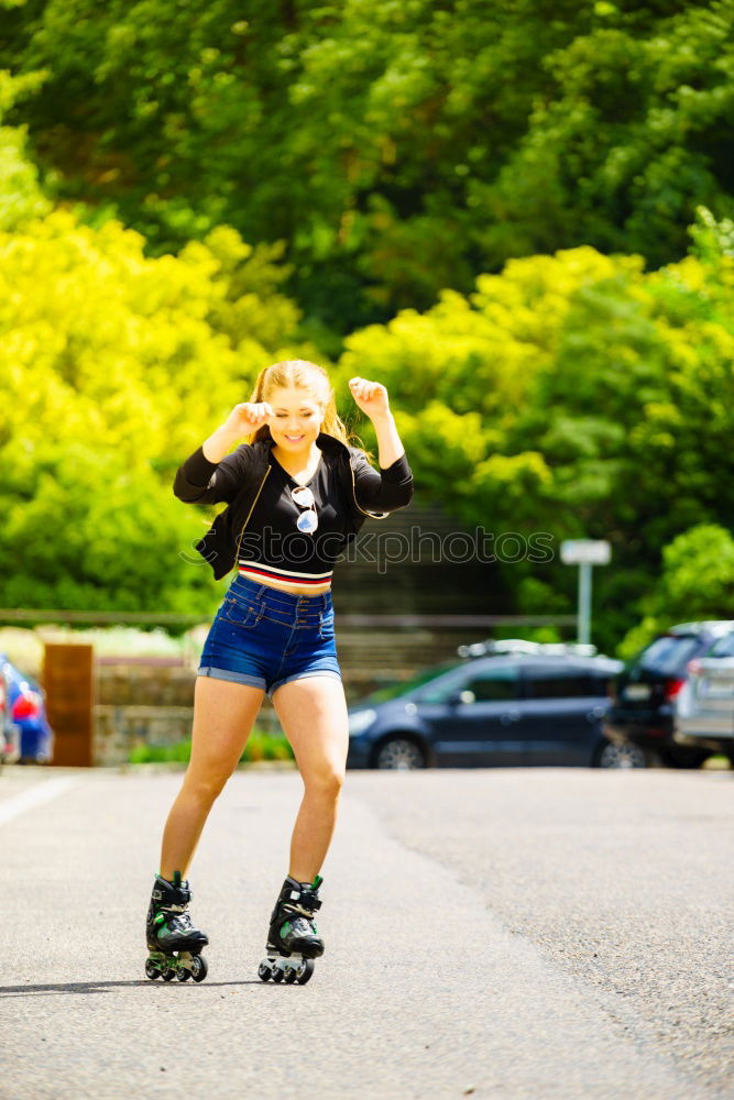 Similar – Image, Stock Photo Slim young woman enjoys inline skating