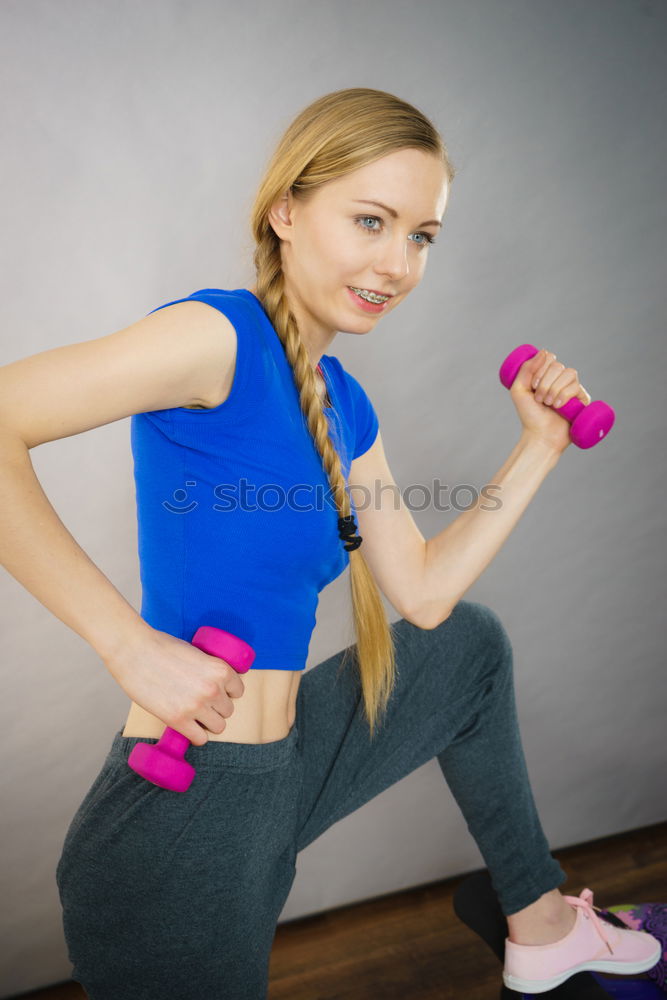 Similar – Woman stretching her body in front of ancient wall in park