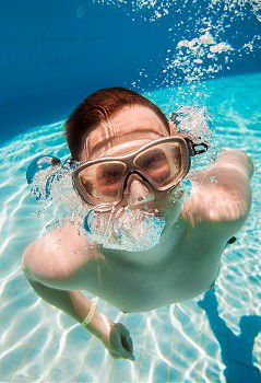 Similar – One little happy boy playing on the inflatable circle in swimming pool at the day time. Concept of friendly family.