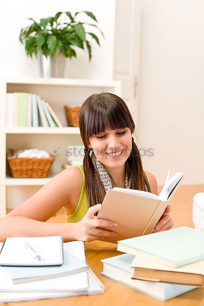 Similar – Image, Stock Photo Young woman in an apron looking up a recipe