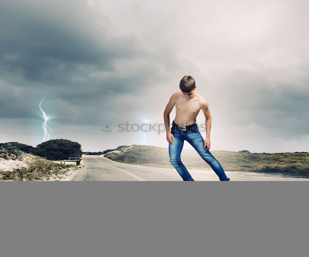 Person with surfboard standing near sea