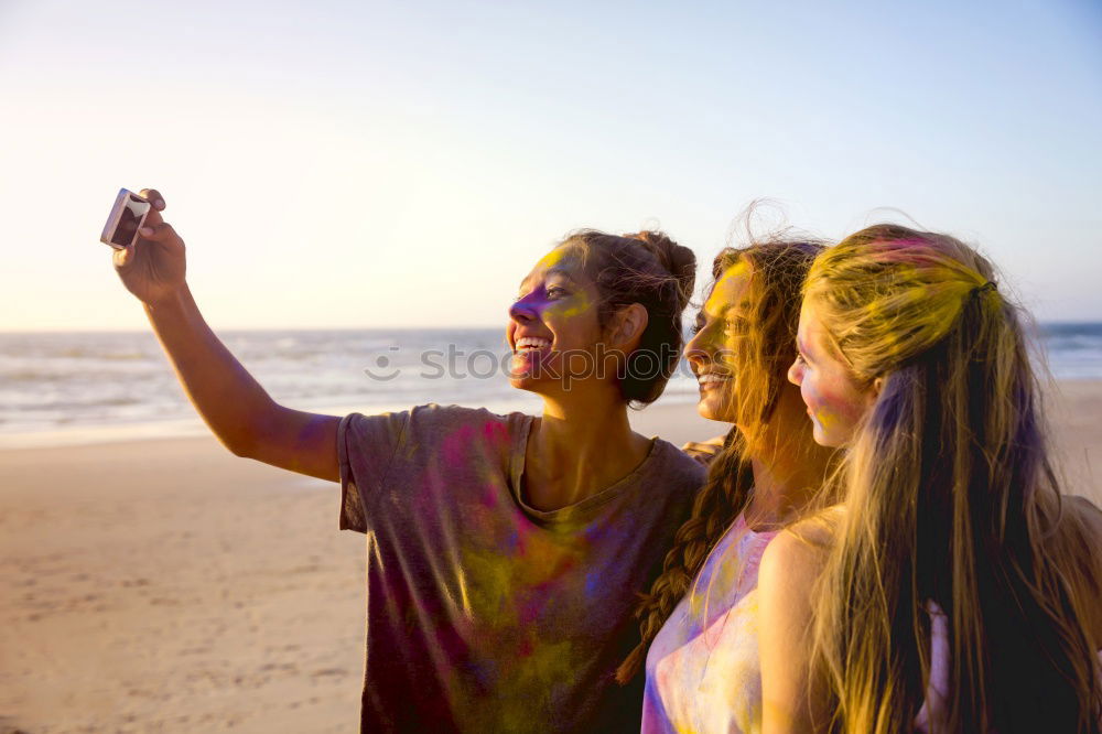 Similar – Group of best friends cheerful on the beach in sunset