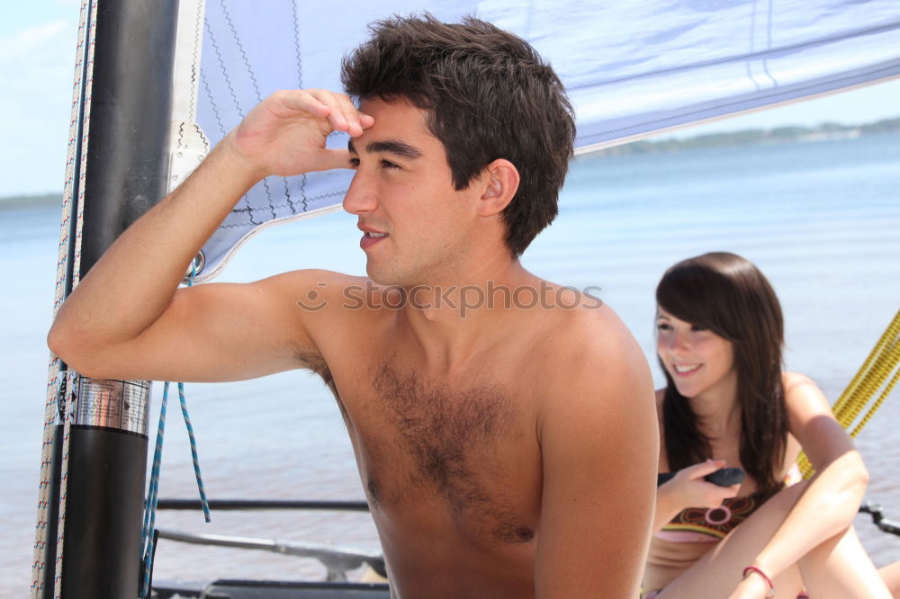 Similar – Young attractive surfer holding his surfboard at the beach