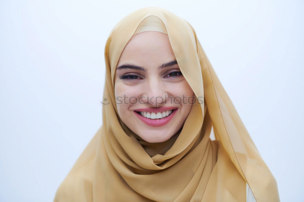 Similar – Smiling young woman wearing hijab outdoors