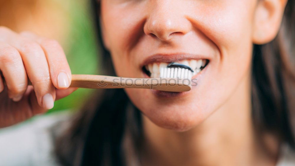 Similar – Crop woman eating sushi