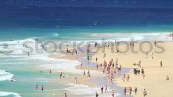 Similar – Bathing at the beach of Nazaré I