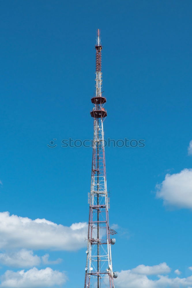 radio antenna in the forest, radio telecommunication mast TV antennas, blue sky, radio antenna