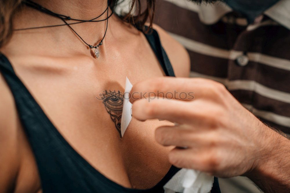 Similar – Image, Stock Photo Young lady biting guy in tattoos