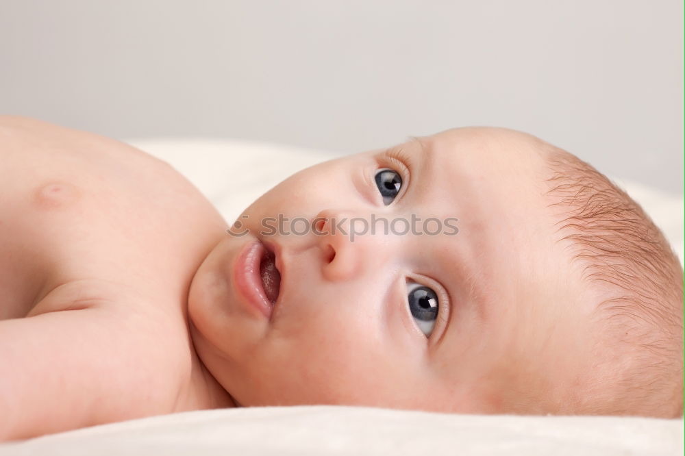 Similar – Baby taking feeding bottle