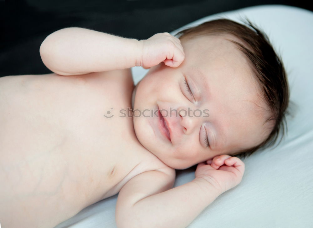 Similar – Portrait of a newborn baby sleeping