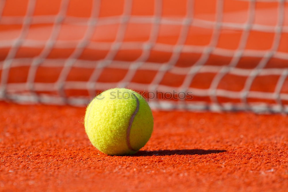 Similar – Image, Stock Photo Yellow tennis ball on red clay ground court