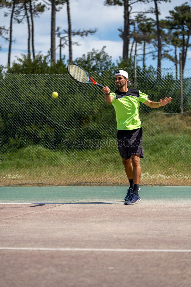 Disabled man athlete training with leg prosthesis.