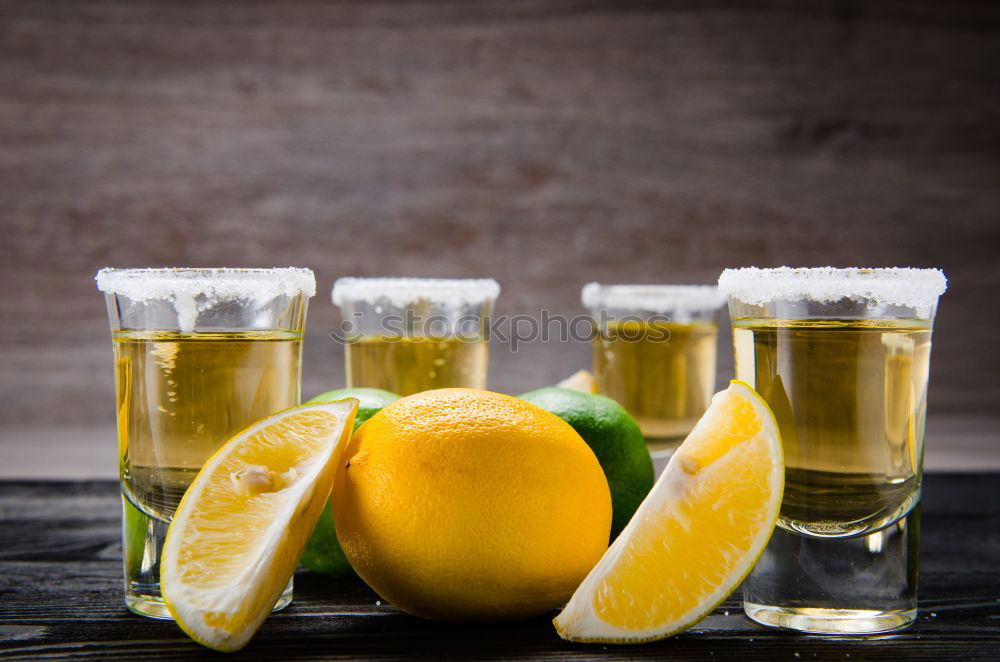 Similar – Tequila in shots with salt rim and lemon