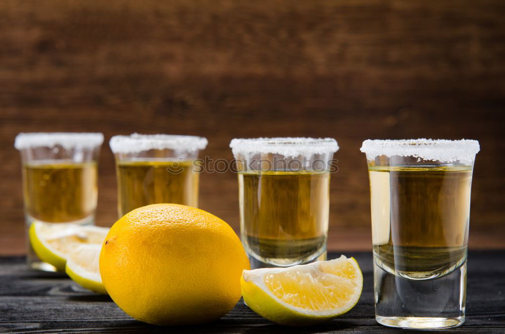 Similar – Tequila in shots with salt rim and lemon