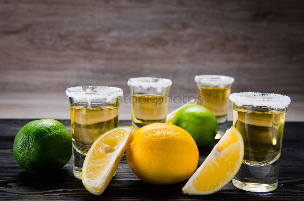 Similar – Tequila in shots with salt rim and lemon