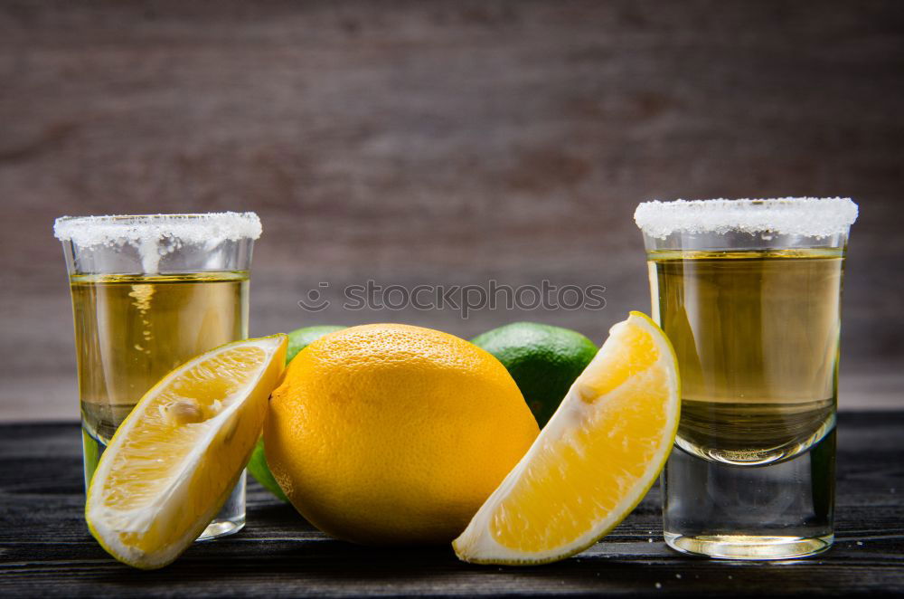 Similar – Tequila in shots with salt rim and lemon