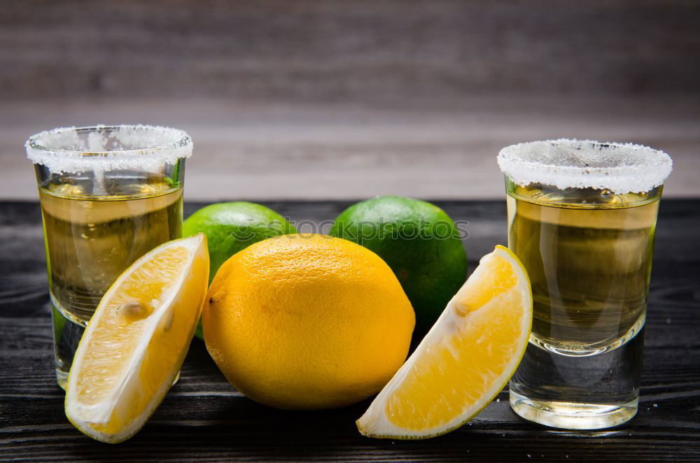 Similar – Tequila in shots with salt rim and lemon