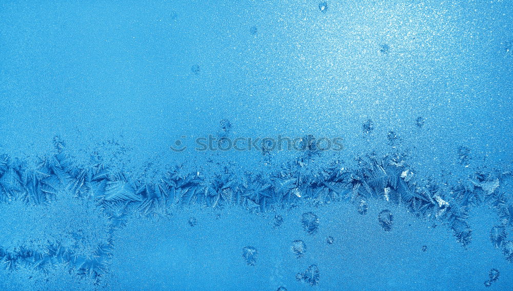 Similar – Image, Stock Photo Ice crystals in sunlight on a glass pane in front of a blue sky