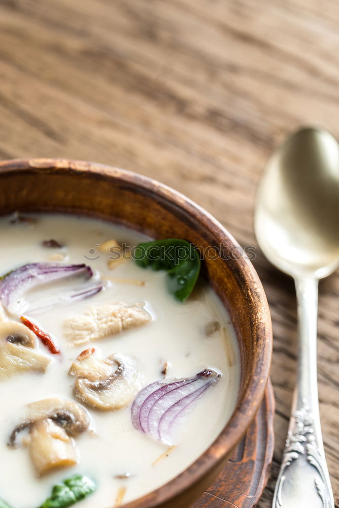 Similar – Image, Stock Photo Broccoli cream soup with roasted brown bread