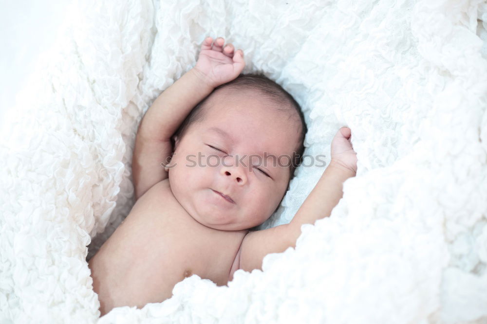 Similar – Image, Stock Photo newborn baby experiencing the world