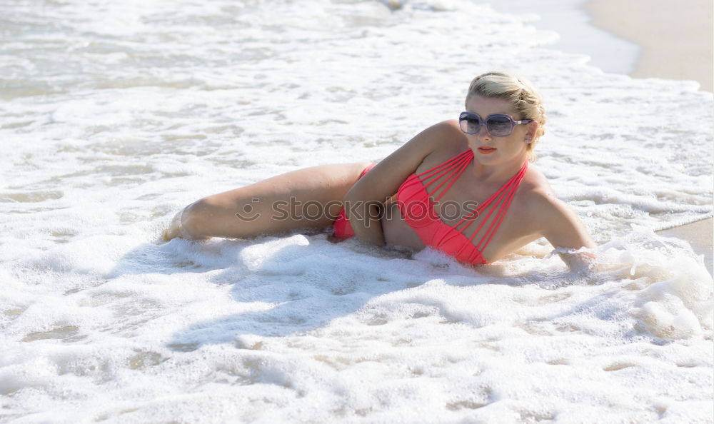 Similar – big woman sitting at the Baltic Sea beach