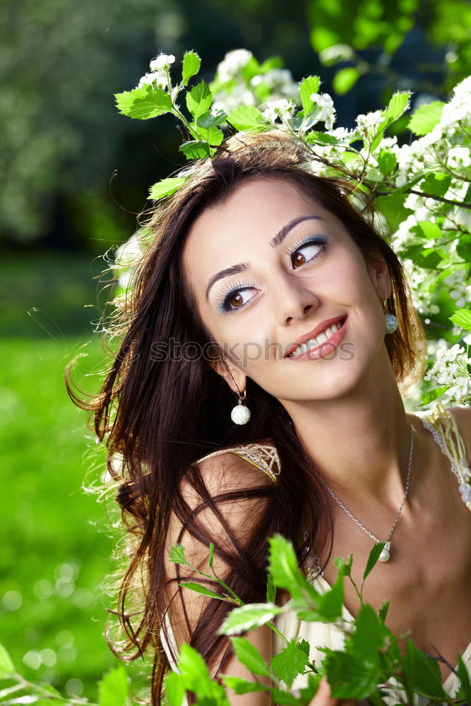 Similar – Young black woman with afro hairstyle smiling in urban park