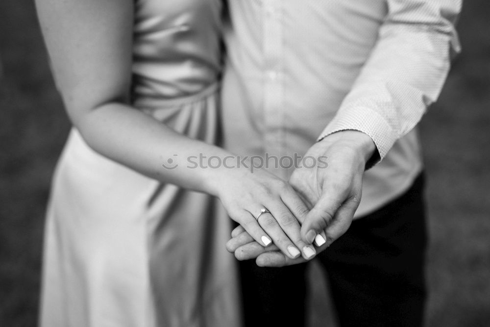 Similar – Image, Stock Photo Couple holding hands