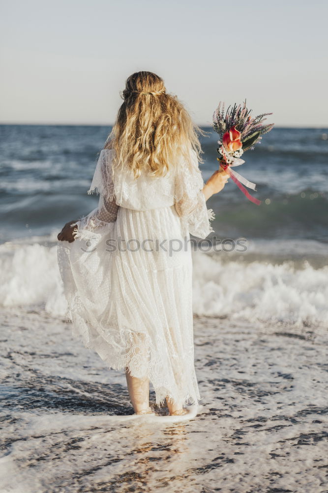 Similar – Image, Stock Photo Crop bride and groom on sand