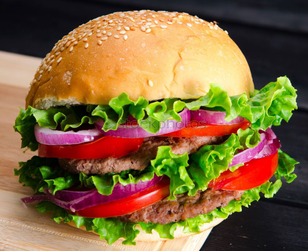 Similar – Image, Stock Photo burger with a meatball and vegetables