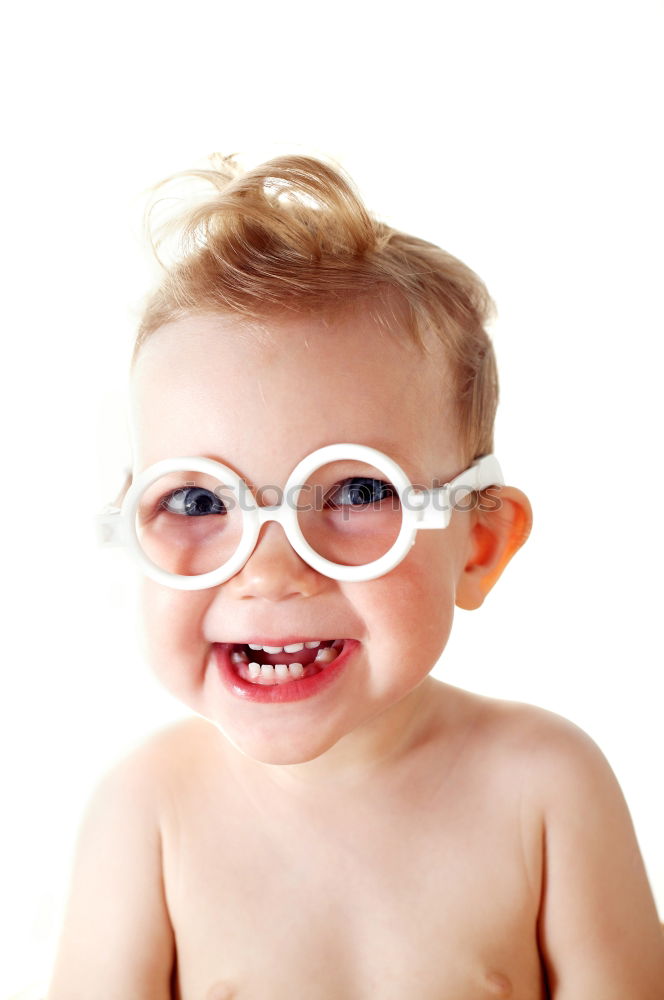 Similar – boy smiling and looking up with carboard glasses