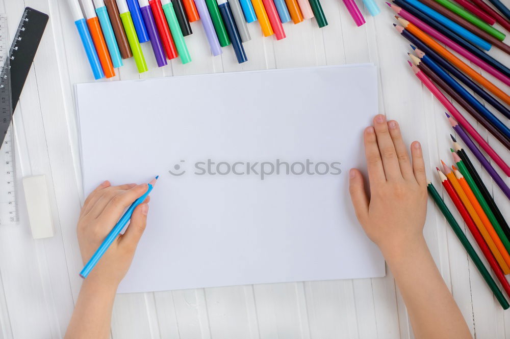 Similar – Image, Stock Photo Girl coloring a simple sketch of a skull