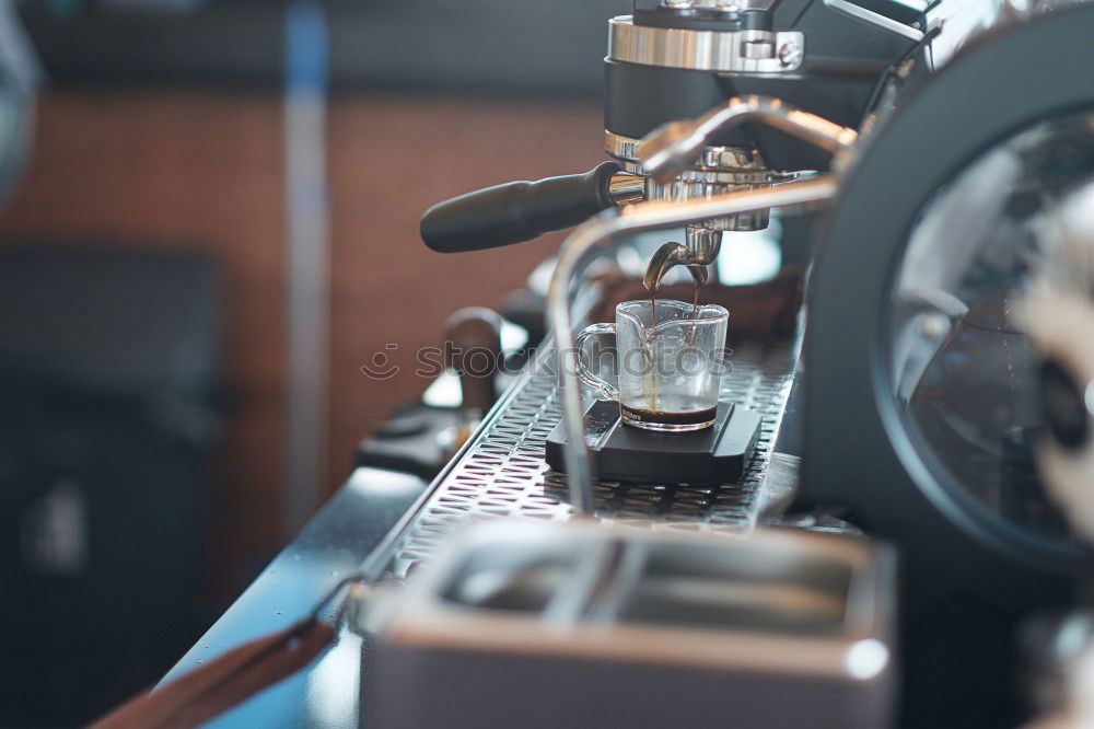 Similar – Preparation of a coffee with a barista coffee machine