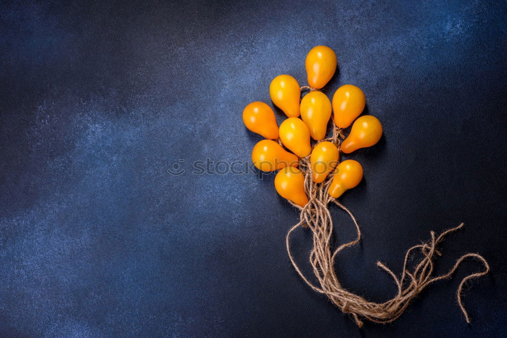 Similar – Oranges on dark background