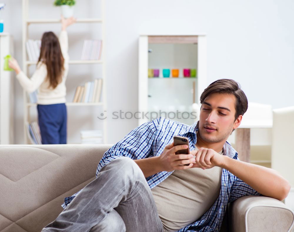 Similar – Image, Stock Photo Couple browsing on online on smartphone at home