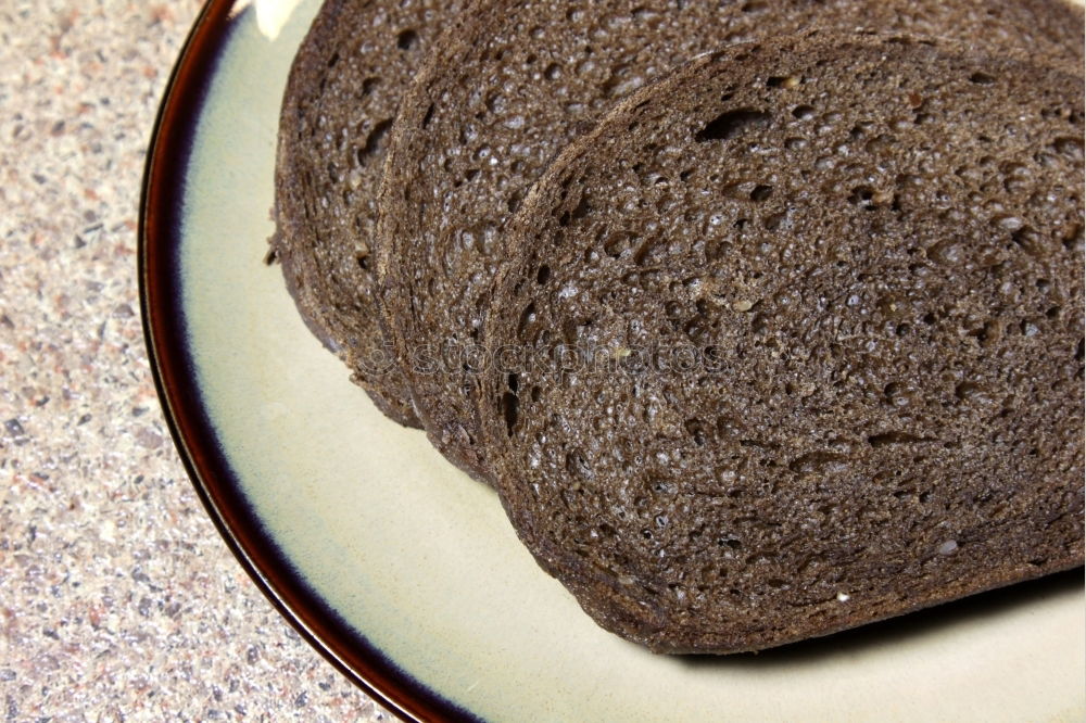 Similar – Käsestulle Brot