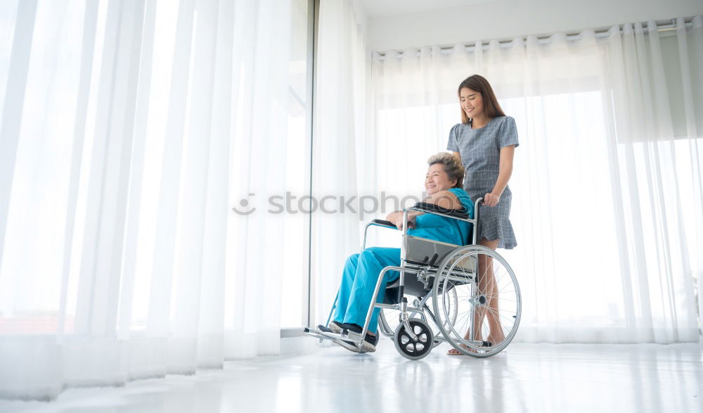 Similar – Senior woman sitting in wheelchair in hospital