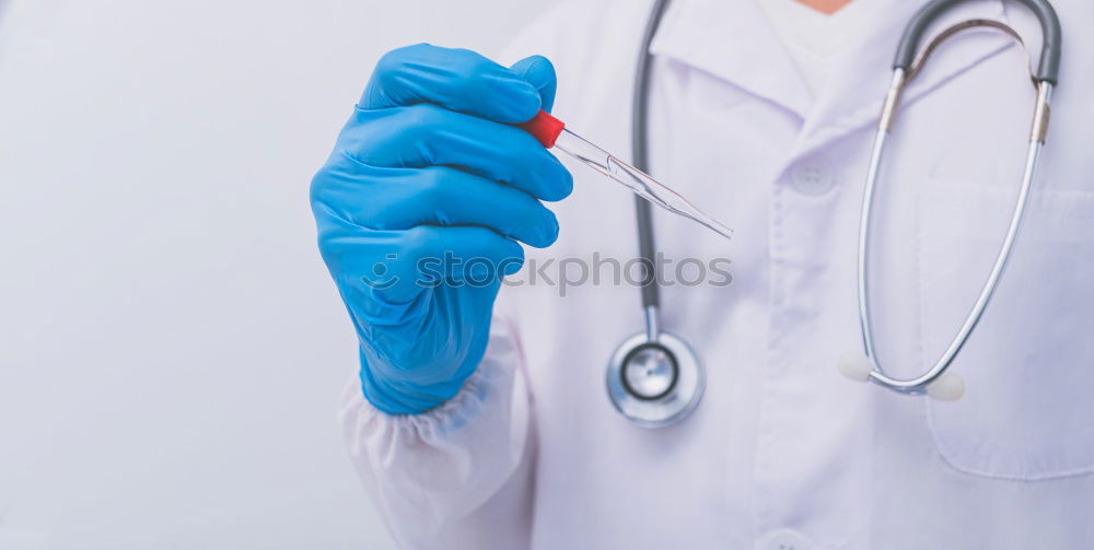 Similar – human hand holding a medical stethoscope